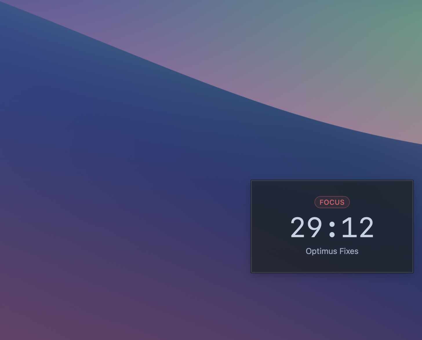 Close-up of the Focusdoro widget in compact steady state showing FOCUS badge, 29:12 countdown, and the current task label Optimus Fixes